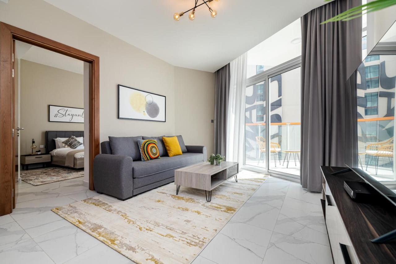 Appartamento Unlock Waters Edge Dubai Esterno foto