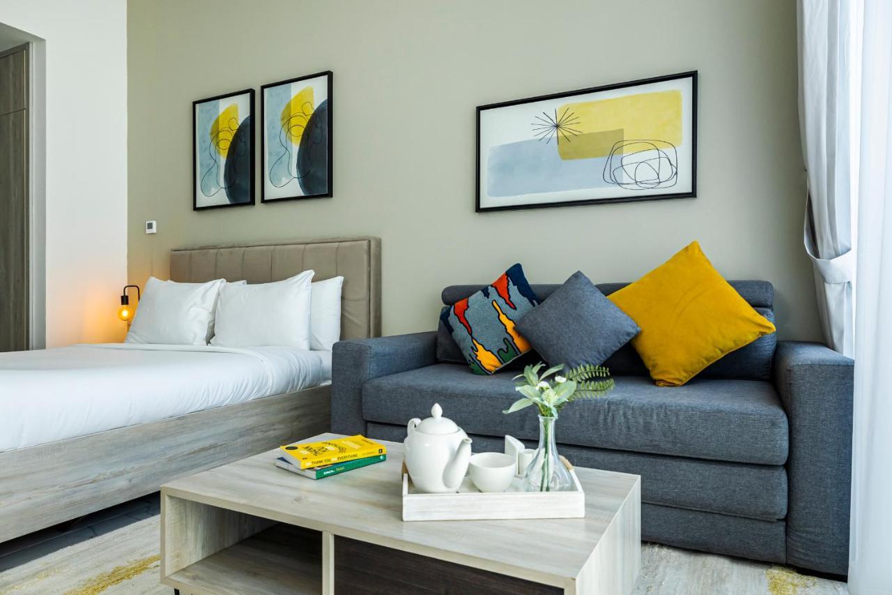 Appartamento Unlock Waters Edge Dubai Esterno foto